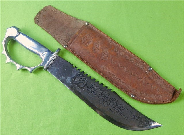 http://www.blackswanantique.com/cdn/shop/products/Mexican_Saw_Back_Engraved_Knuckle_Fighting_Knife_2_1200x1200.jpg?v=1539866563